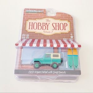 NWT 1969 Nissan Patrol Green with Two Surf Boards "The Hobby Shop"